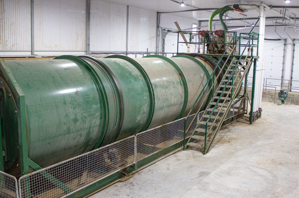 An in-vessel system composts separated manure solids